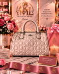 The Blush Embossed Signature Satchel